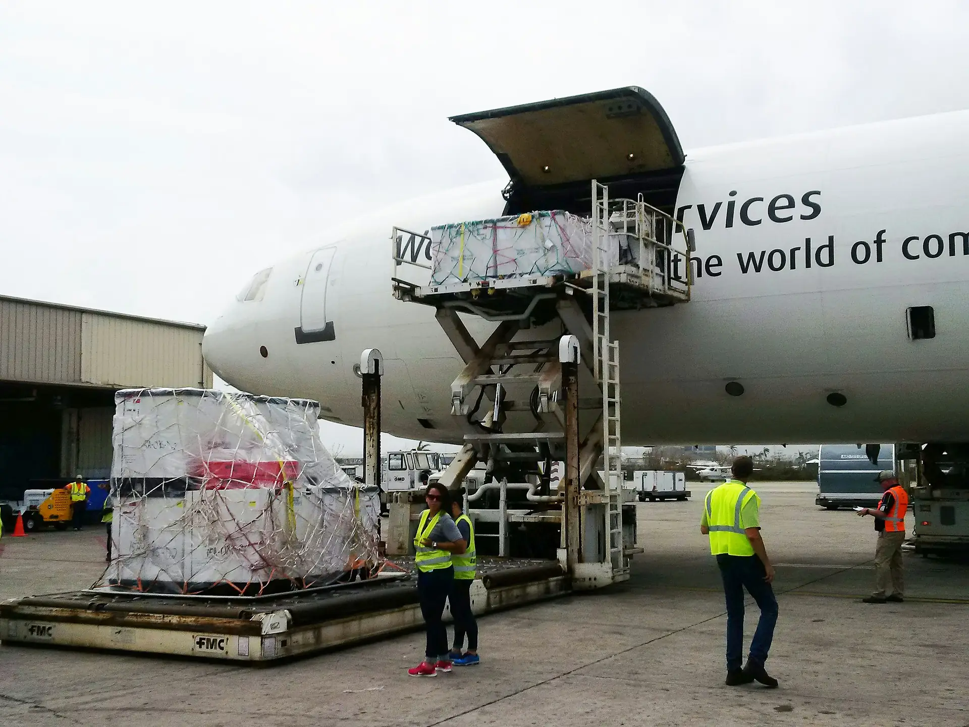 Cargo being loaded into the nose of a freight aircraft